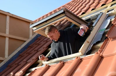 Pose de fenêtres de toit Velux à Feuguerolles